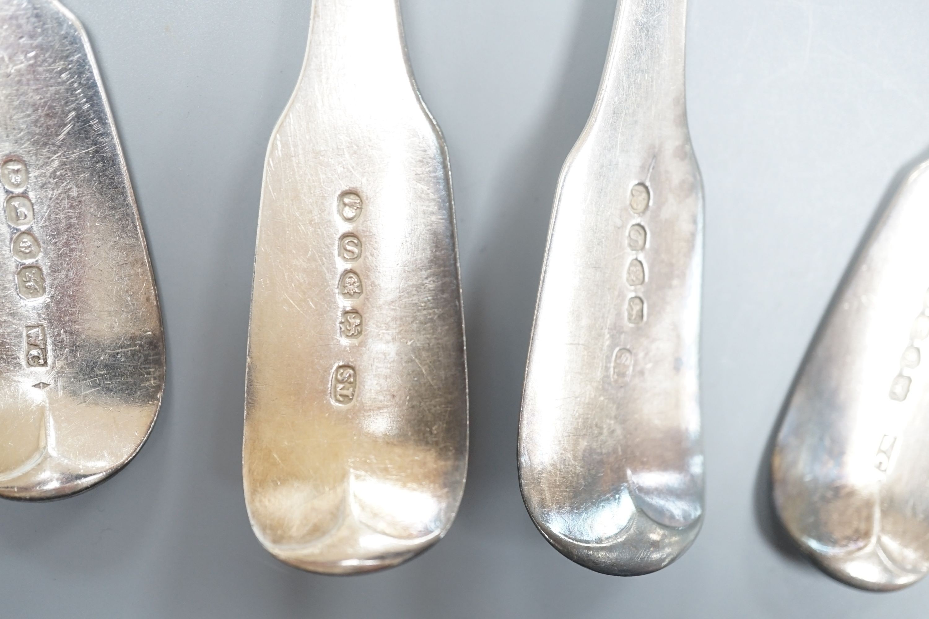 Two pairs of William IV silver fiddle pattern table spoons, London, 1831 and 1833, 9oz.